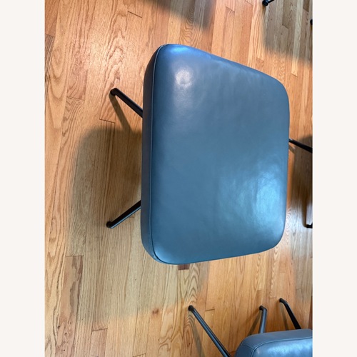 Used EQ3 Donna Blue Leather Ottoman for sale on AptDeco