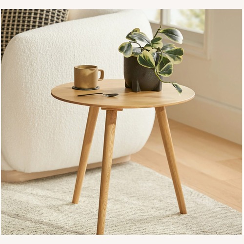 Used Article Amoeba Light Brown Wood Side Table for sale on AptDeco