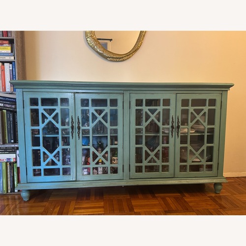 Used Raymour & Flanigan 4-Door Fretwork Accent Credenza for sale on AptDeco