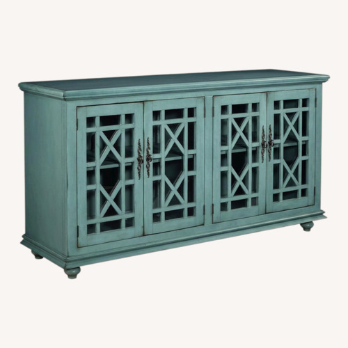 Used Raymour & Flanigan 4-Door Fretwork Accent Credenza for sale on AptDeco