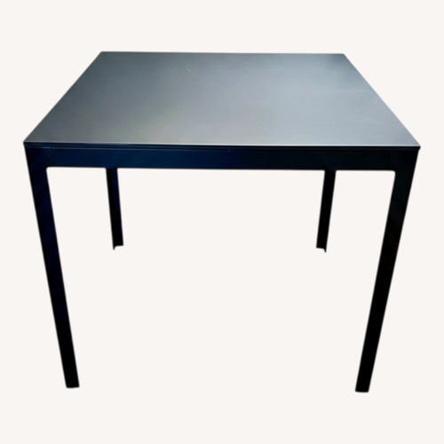 Used Design Within Reach Min Black Metal Dining Table for sale on AptDeco