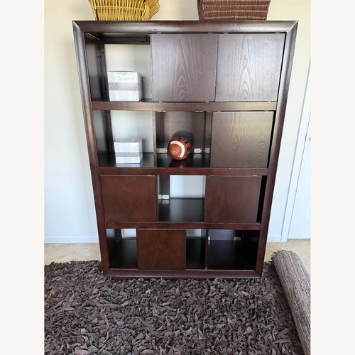 Used Dark Brown Wood Wall Unit for sale on AptDeco