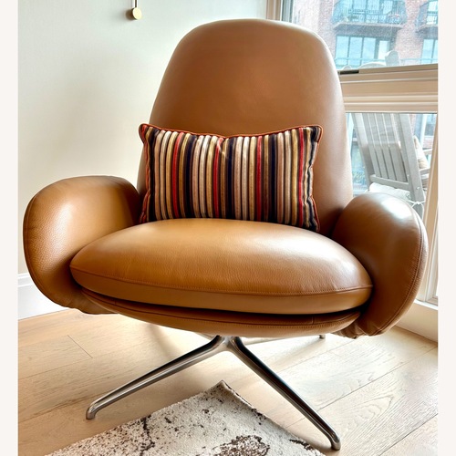 Used Design Within Reach Vala Swivel Light Brown Leather Recliner for sale on AptDeco