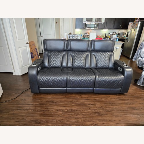 Used Rooms To Go Port Royal Leather Triple Power Reclining Sofa for sale on AptDeco