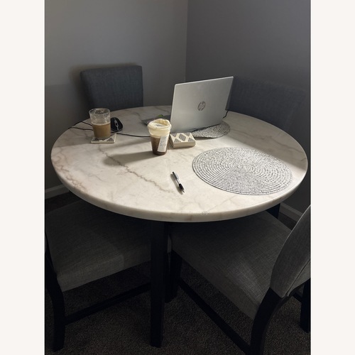 Used Bob's Discount Furniture Light Gray Dining Table for sale on AptDeco