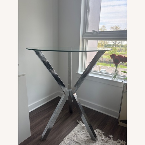 Used Silver Glass Dining Table for sale on AptDeco