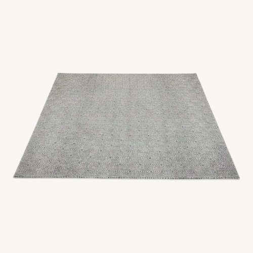 Used Article Bovi Light Gray Fabric Area Rug 8' x 10' for sale on AptDeco