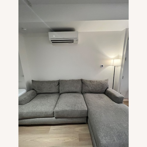 Used Raymour & Flanigan Light Gray 2 Piece Sectional for sale on AptDeco