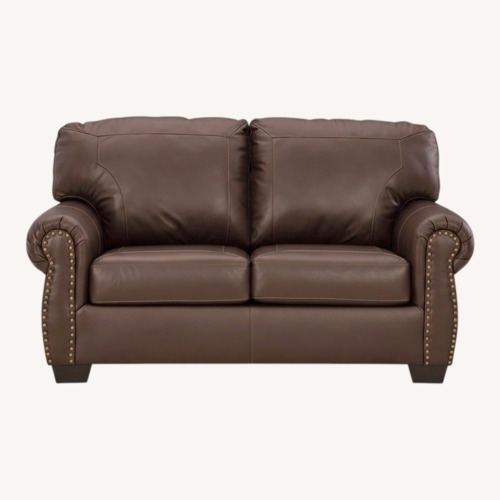 Used Dark Brown Leather Loveseat for sale on AptDeco