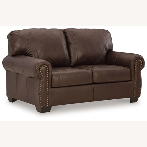 Used Dark Brown Leather Loveseat for sale on AptDeco