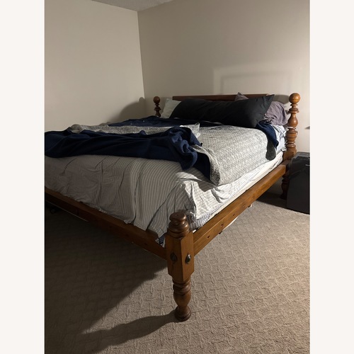Used Vintage/Antique Finds Natural Wood King Bed for sale on AptDeco