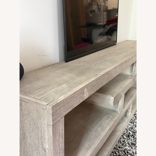 Used Living Spaces Light Gray Wood Media Storage for sale on AptDeco