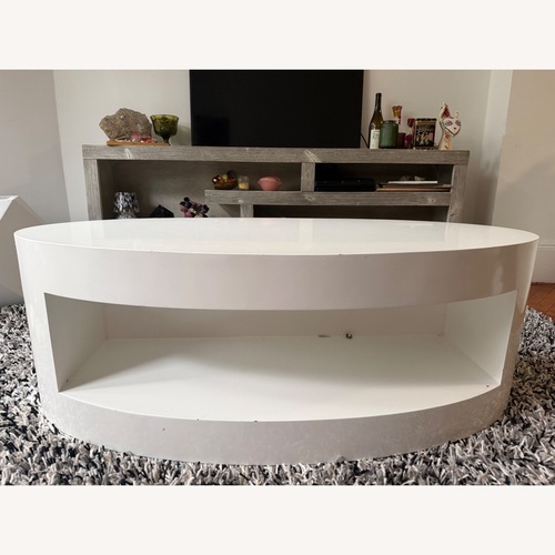 Used White Wood Round Retro Style Coffee Table for sale on AptDeco