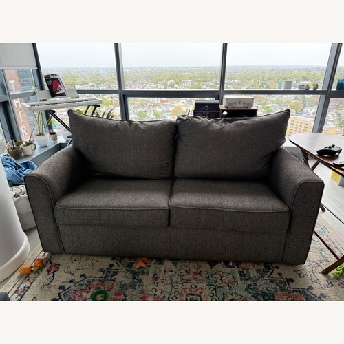 Used Raymour & Flanigan Grey Modern Sleeper Sofa for sale on AptDeco