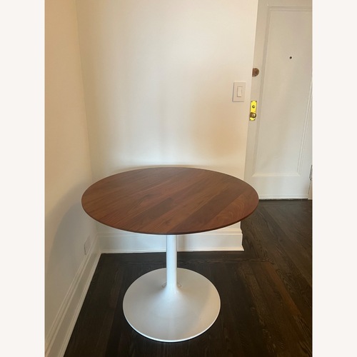 Used Room & Board Aria Round Dining Table for sale on AptDeco