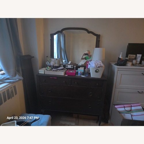 Used Vintage/Antique Dark Brown Wood Dresser for sale on AptDeco