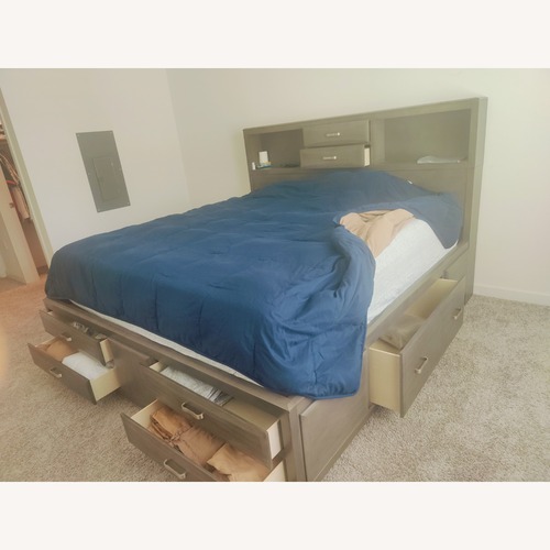 Used Ashley Furniture Dark Brown Wood King Bed for sale on AptDeco