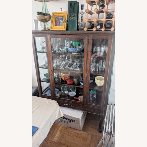 Used Antique Dark Brown Wood Wall Unit for sale on AptDeco