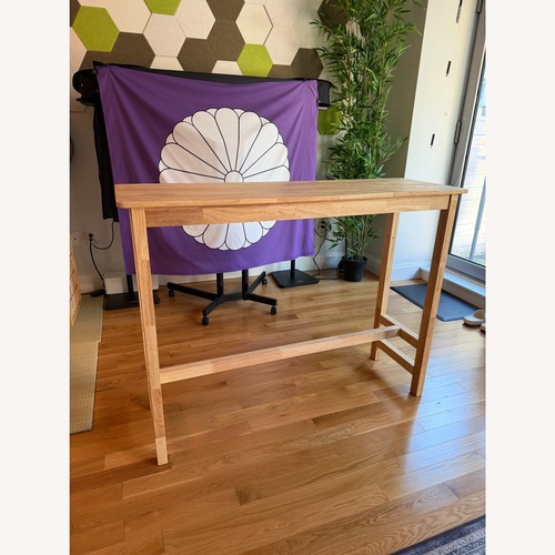 Used Natural Wood Dining Table for sale on AptDeco
