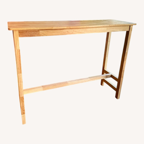 Used Natural Wood Dining Table for sale on AptDeco