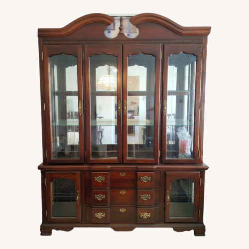Used Dark Brown Wood Wall Unit for sale on AptDeco