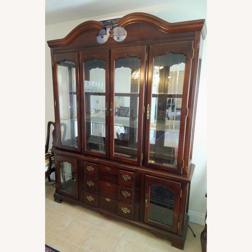 Used Dark Brown Wood Wall Unit for sale on AptDeco