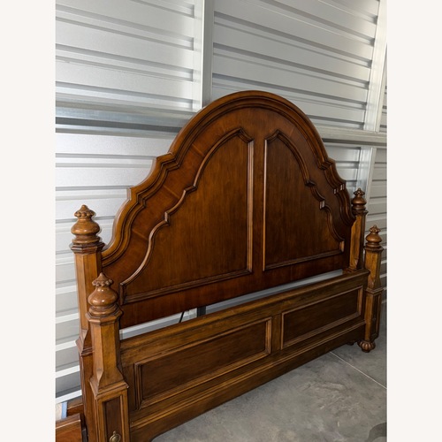 Used Ethan Allen Dark Brown Wood California King Bed for sale on AptDeco