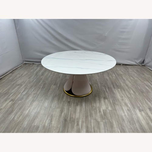 Used Everly Quinn Pedestal Round Dining Table for sale on AptDeco