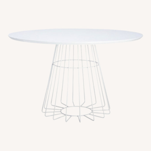 Used CB2 White Compass Dining Table for sale on AptDeco