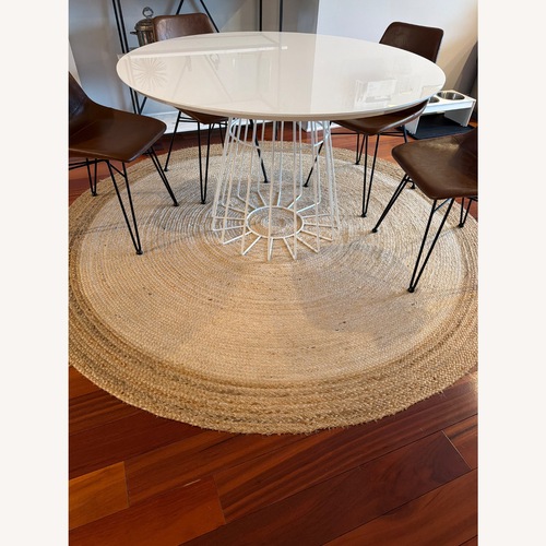 Used Safavieh Natural Jute Area Rug 7' x 7' for sale on AptDeco