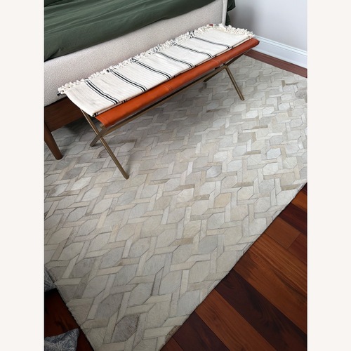 Used Safavieh White Leather Area Rug 5' x 8' for sale on AptDeco