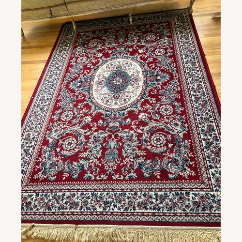 Used Antique Area Rug 5' x 8' for sale on AptDeco