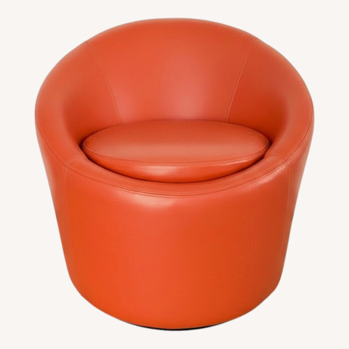 Used Jonathan Adler Orange Leather Swivel Chair for sale on AptDeco