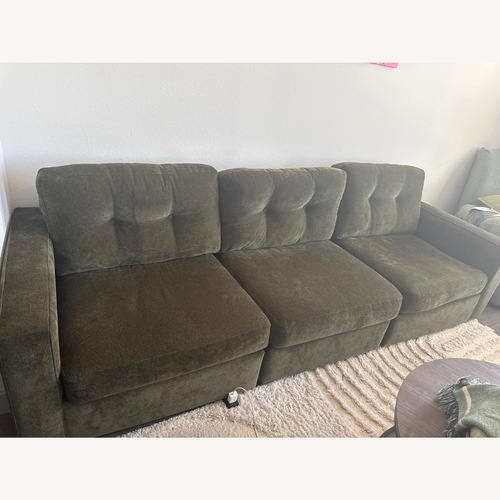 Used Rooms To Go  Green 3+ Piece Sectional for sale on AptDeco