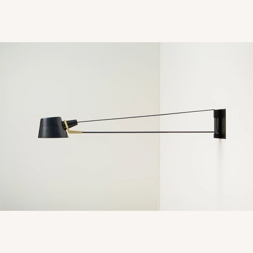 Used Ravenhill Studio 48" Wired Wall Sconce for sale on AptDeco