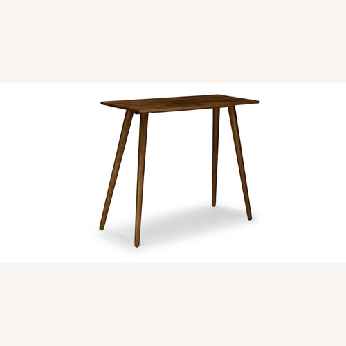 Used Article Dark Brown Wood Dining Table for sale on AptDeco