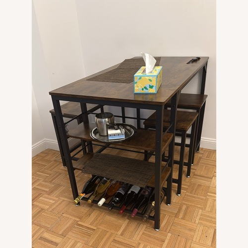 Used Dark Brown Wood Dining Sets for sale on AptDeco