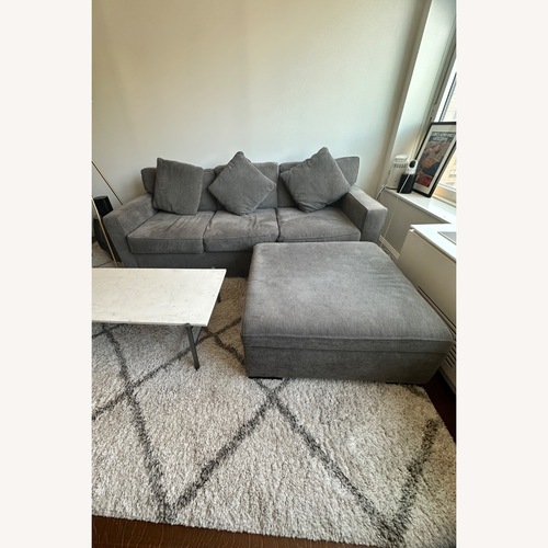 Used Macy's Dark Gray Fabric Sofa for sale on AptDeco
