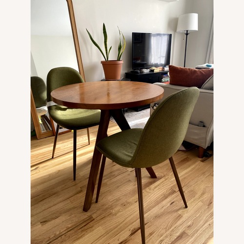 Used West Elm Wood Dining Table for sale on AptDeco