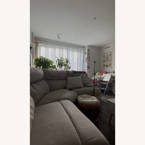 Used Bob's Discount Furniture Everest Light Gray 136'' Power Reclining 7 Piece Sectional  for sale on AptDeco