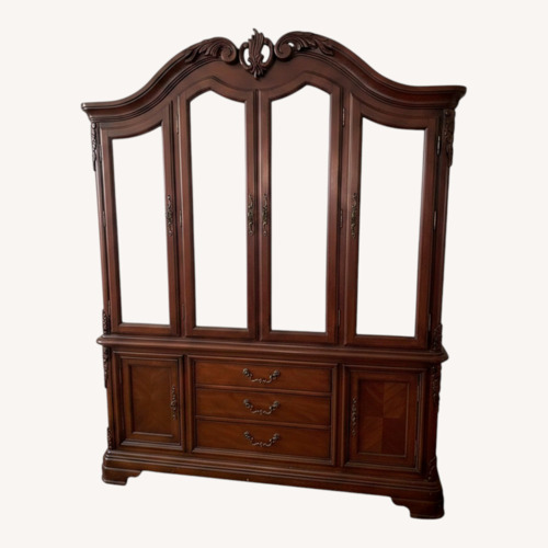Used Vintage/Antique Dark Brown Wood Armoire for sale on AptDeco