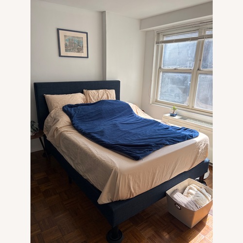 Used Zinus Blue Upholstered Queen Bed   for sale on AptDeco