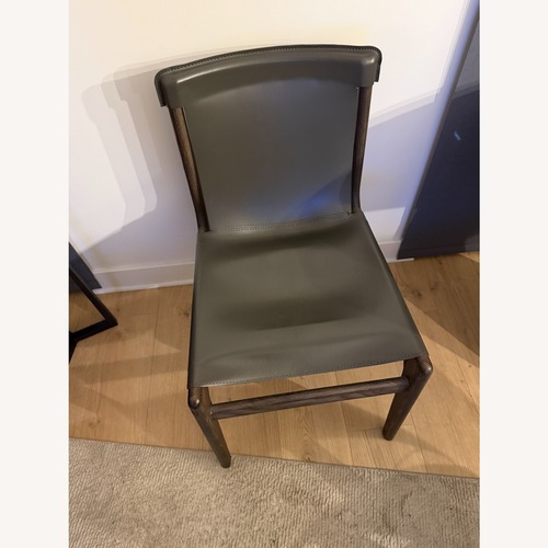 Used CB2 Dark Gray Leather Dining Chair for sale on AptDeco