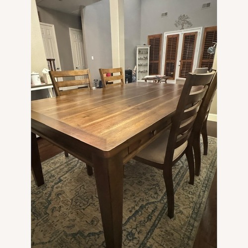 Used Ashley Furniture Dark Brown Wood Dining Set for sale on AptDeco