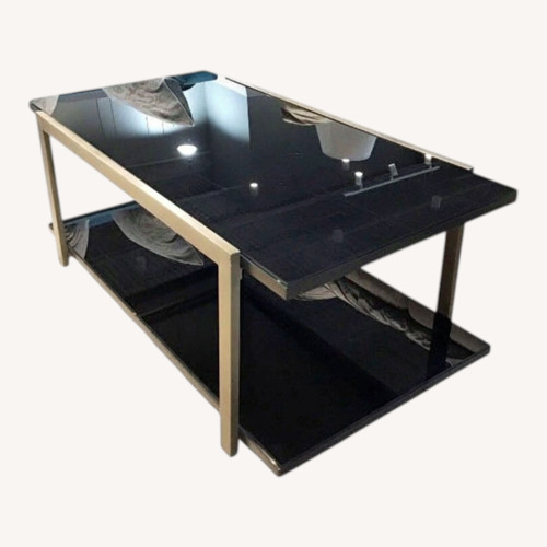 Used Tiered Metal & Smoked Glass Coffee Table for sale on AptDeco