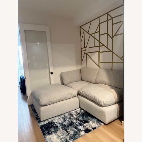 Used Living Spaces 2 Seater Sofa with Ottoman for sale on AptDeco