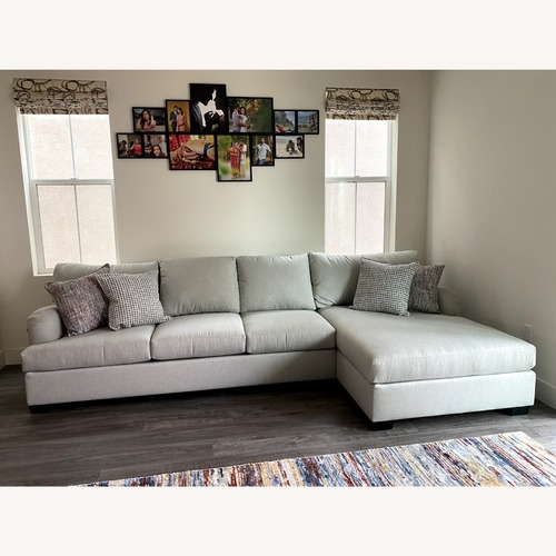Used Living Spaces Light Gray 2 Piece Sectional for sale on AptDeco