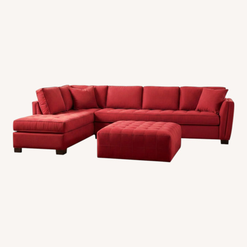 Used Rooms To Go  Red 2 Piece Sectional for sale on AptDeco