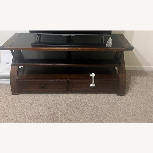 Used Dark Brown Wood Dresser for sale on AptDeco