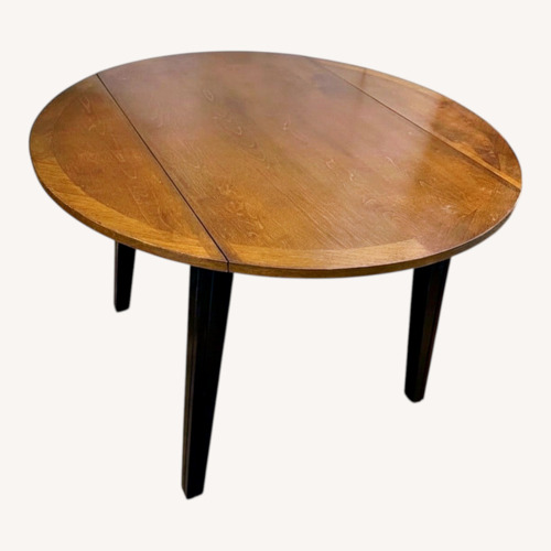 Used Vintage/Antique Dark Brown Dining Table for sale on AptDeco